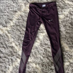 Purple Nike workout leggings
